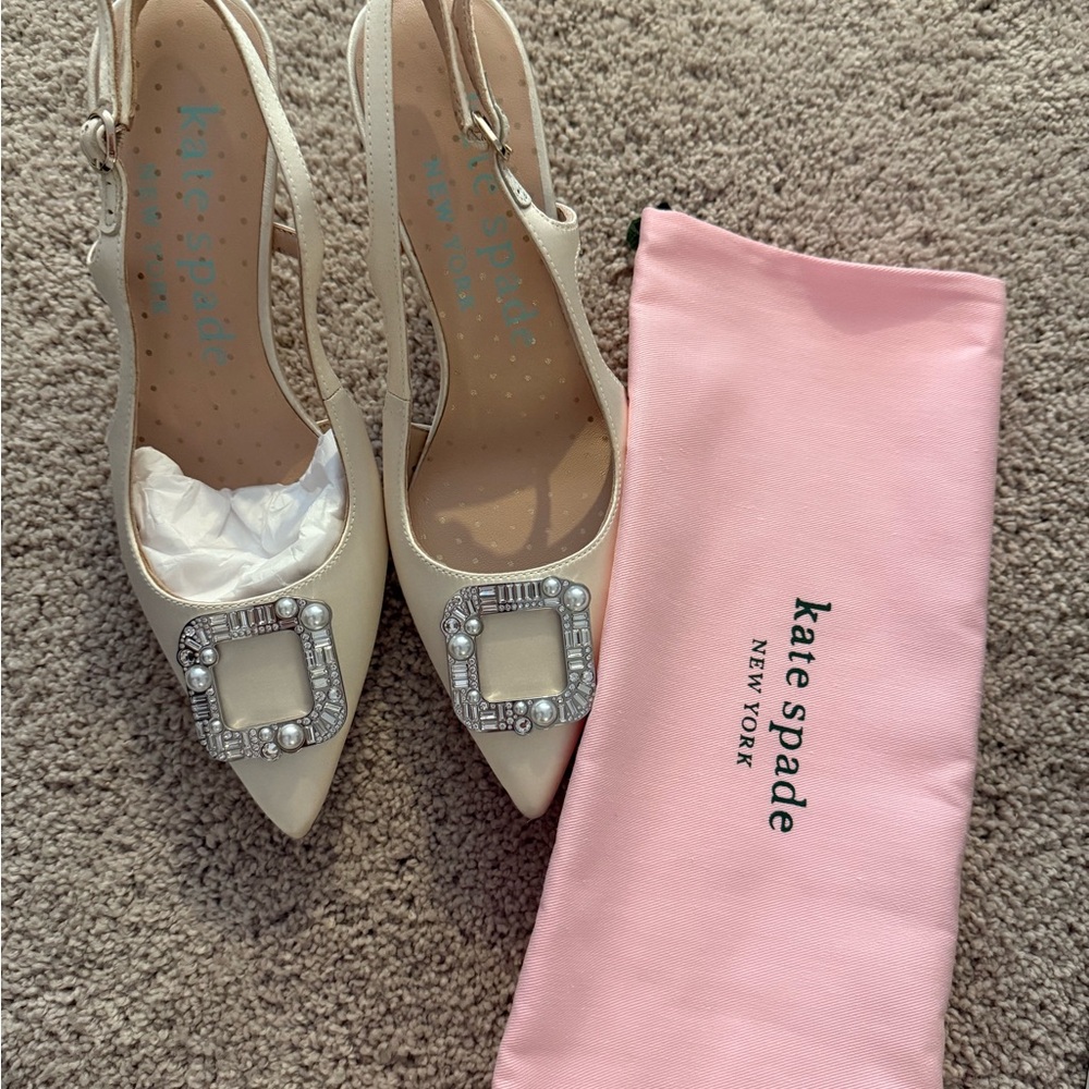 Kate Spade Cream Heels with Elegant Design and Pointed Toe